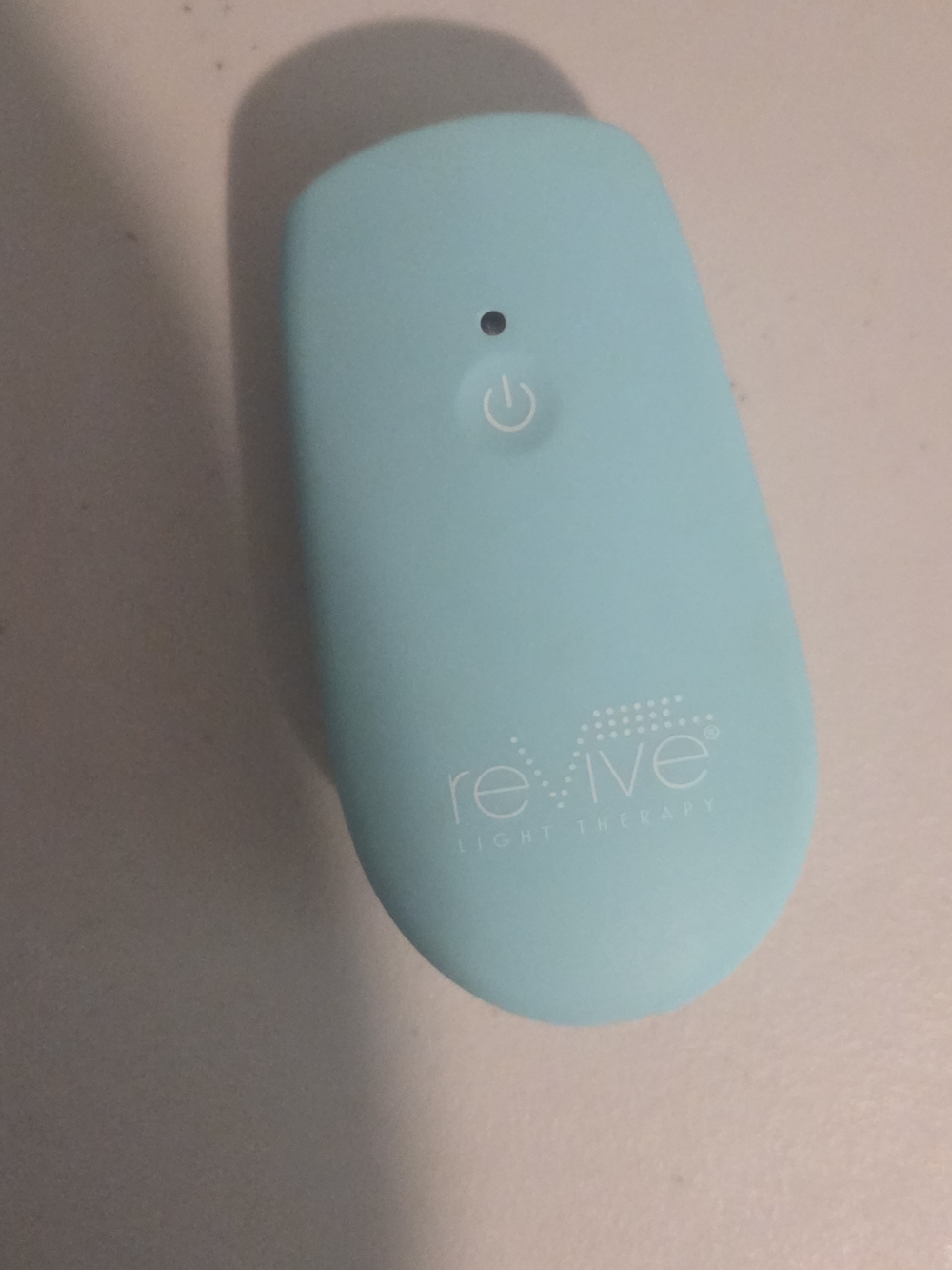Revive Light Therapy Handheld Device - Aqua Blue